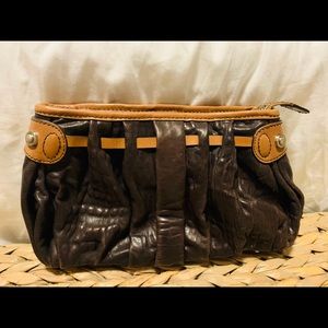 Authentic leather clutch in BRAND NEW condition